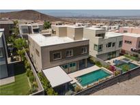 Stunning two-story home featuring a private pool, spa, and covered patio in a desirable community at 292 Crimson Edge St, Henderson, NV 89012
