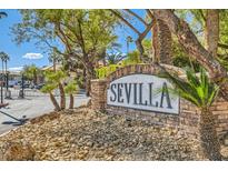 Sevilla community sign surrounded by lush landscaping, offering a welcoming entrance and serene environment at 3135 S Mojave Rd # 146, Las Vegas, NV 89121