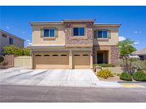 Charming two-story home with a three-car garage and desert landscaping at 776 Flowing Meadow Dr, Henderson, NV 89014