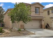 Inviting two-story home with a well-maintained yard and convenient two-car garage at 5213 Welch Valley Ave, Las Vegas, NV 89131