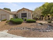 Charming single-story home featuring stone landscaping and attractive curb appeal at 5240 Las Cruces Dr, Las Vegas, NV 89130