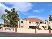 Laughlin Bay Village condo with desert landscaping, red tile roof, and stucco facade at 3740 Desert Marina Dr # 11, Laughlin, NV 89029