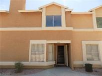 Charming townhome with stucco exterior, decorative windows, and inviting front entrance at 3890 Terrazzo Ave, Las Vegas, NV 89115