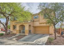 Inviting two-story home featuring desert landscaping and a two-car garage at 2714 Cottonwillow St, Las Vegas, NV 89135