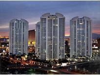 Luxury high-rise condos offer city views and balconies, set against a vibrant dusk sky at 2777 Paradise Rd # 1605, Las Vegas, NV 89109
