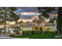Charming single-story home featuring a tile roof, well-manicured landscaping, and an attached two-car garage at 8969 Rivers Edge Dr, Las Vegas, NV 89117