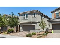 Charming two-story home with a well-maintained front yard and a two-car garage in a lovely neighborhood at 2932 Tranquil Brook Ave, Henderson, NV 89044