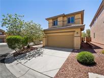 Charming two-story home with a well-maintained lawn and inviting curb appeal at 10609 Sand Mountain Ave, Las Vegas, NV 89166