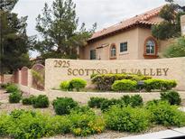 Welcoming community entrance featuring lush landscaping and clear signage at Scottsdale Valley at 2925 Wigwam Pkwy # 724, Henderson, NV 89074