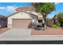 Charming two-story home featuring a well-maintained front yard and attached two-car garage at 3644 Shanagolden St, Las Vegas, NV 89129