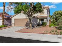 Charming home featuring desert landscaping, a two-car garage, and a welcoming entryway at 3644 Shanagolden St, Las Vegas, NV 89129