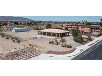 Expansive lot featuring a charming single story home with a basketball court and a large detached garage at 5315 N Fort Apache Rd, Las Vegas, NV 89149