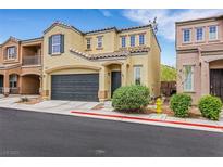 Inviting two-story home with a spacious two-car garage and desert landscaping in a modern community at 7361 Ringquist St, Las Vegas, NV 89148