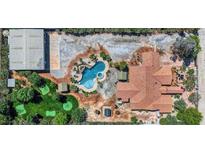 Stunning aerial view of estate with a custom pool, putting green, and extensive parking at 7760 Haven St, Las Vegas, NV 89123
