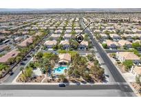 A lush community with a swimming pool and clubhouse at 7985 Simone Ave, Las Vegas, NV at 7985 Simone Ave, Las Vegas, NV 89147
