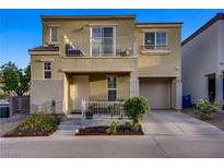Charming two-story home featuring a small front yard and balcony at 9157 Acclamation Ct, Las Vegas, NV 89149