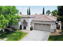 Charming single-story home with a well-manicured lawn, tiled roof, and attached two-car garage at 1116 Piazza Telle, Henderson, NV 89052