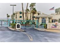 Inviting gated community entrance with lush landscaping and charming architectural details at 3550 Bay Sands Dr # 3001, Laughlin, NV 89029