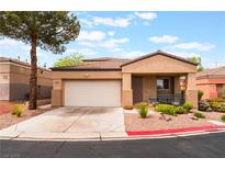 Charming single-story home featuring a two-car garage and desert landscaping at 601 Bear Grass St, Las Vegas, NV 89144