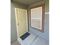 Apartment entry featuring decorative security door, screen and address number at 555 E Silverado Ranch Blvd # 1069, Las Vegas, NV 89183