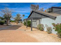 Cozy townhome features a pergola entryway and desert landscaping at 3924 Blackford Pl, Las Vegas, NV 89102