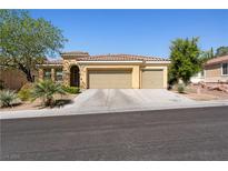 Charming single-story home showcasing a well-maintained yard, and a spacious three car garage at 6417 Giant Oak St, North Las Vegas, NV 89084