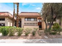 Charming condo with red tile roof, mature landscaping, and a desert-friendly yard at 3120 S Eastern Ave # 6, Las Vegas, NV 89169
