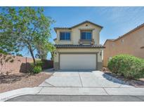 Charming two-story home with a well-manicured lawn and a two-car garage at 8421 Cheerful Brook Ave, Las Vegas, NV 89143