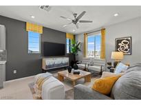 Cozy living room with modern furnishings, natural light, and stylish decor at 147 Harmonica Ave # Lot 24, Henderson, NV 89015