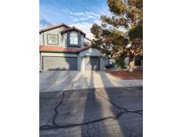 Charming two-story home featuring a two-car garage and well-maintained front yard at 3704 Blairmoor St, North Las Vegas, NV 89032