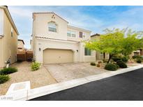 Charming two-story home with a two car garage and low maintenance desert landscaping at 8929 Sleepy Panda Ave, Las Vegas, NV 89148