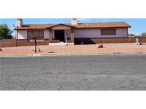 Charming single-story home boasting a xeriscaped front yard and brick accents at , Henderson, NV 89015