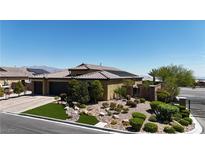 Beautiful single story home with desert landscaping, tile roof and attached two car garage at 5852 Ireland Ridge Ct, Las Vegas, NV 89149