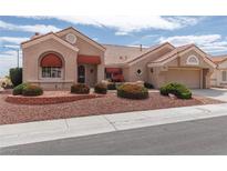 Charming single-story home with well-manicured desert landscaping and a two car garage at 3032 Bonnie Rock Dr, Las Vegas, NV 89134