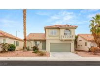 Charming two-story home featuring a well-maintained front yard, tile roof, and attached two-car garage at 3709 Misty Falls St, Las Vegas, NV 89129