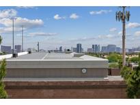 Wide angle view of Las Vegas skyline, featuring modern architecture and clear blue skies with scattered clouds at 7950 W Flamingo Rd # 2066, Las Vegas, NV 89147