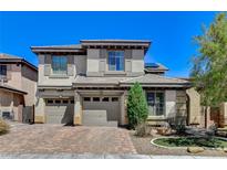 Charming two-story home with a three-car garage and well-maintained landscaping at 8212 Swallow Falls St, North Las Vegas, NV 89085