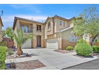 Inviting two-story home featuring a three-car garage and a well-manicured front yard at 9009 Ochoa St, Las Vegas, NV 89143