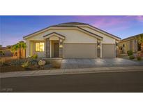 Charming single-story home with a two-car garage and desert landscaping at 1357 Manassas Rdg Rdg, Mesquite, NV 89027