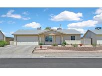 Charming single-story home featuring a well-maintained front yard and inviting curb appeal at 421 Engel Ave, Henderson, NV 89011