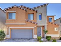 Two-story home with neutral stucco, gray garage door, and low-maintenance landscaping at 7057 Millers Run St, North Las Vegas, NV 89084