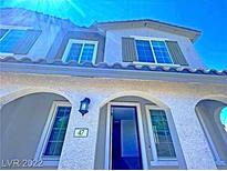 Charming two-story home with arched front entry and desert landscaping at 20 Barbara Ln # 47, Las Vegas, NV 89183