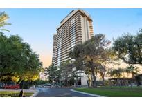 High-rise building with numerous balconies and landscaped grounds at 3111 Bel Air Dr # 12E, Las Vegas, NV 89109