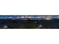 Panoramic city view of Las Vegas skyline at night, visible from rooftop at 7364 Marbury St, Las Vegas, NV 89166