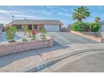 Charming single-story home with a well-maintained front yard and long driveway at 3558 Wayne Cir, Las Vegas, NV 89121
