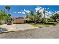 Charming single-story home featuring a spacious driveway, mature trees, and a well-manicured front yard at 3753 S Rosecrest Cir, Las Vegas, NV 89121