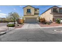 Charming two-story home featuring a neutral color palette, a two-car garage, and low maintenance landscaping at 2929 Salado Creek Ave, North Las Vegas, NV 89081