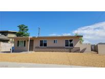 Charming single-story home featuring a low-maintenance yard and neutral paint scheme at 4804 Apawana Ln, Las Vegas, NV 89108