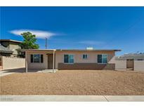 Cozy single story home with a desert landscape and a covered entry way, great curb appeal at 4804 Apawana Ln, Las Vegas, NV 89108