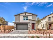 Charming two-story home featuring a modern design, a two-car garage, and drought-resistant landscaping at 1019 Gentle Swan St # 693, Henderson, NV 89011